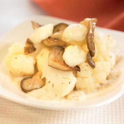 Coliflor con setas y queso de cabra