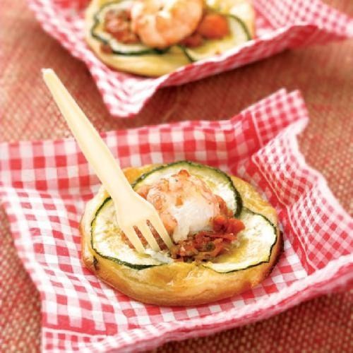 Minipizza de tomate, calabacín y cigalas