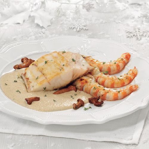 Corvina amb llagostins i salsa de bolets