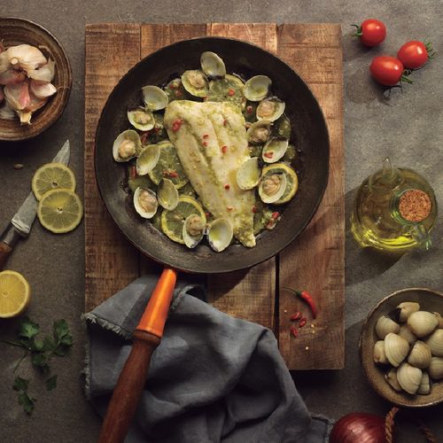 Lluç amb salsa verda amb llimona i cloïsses