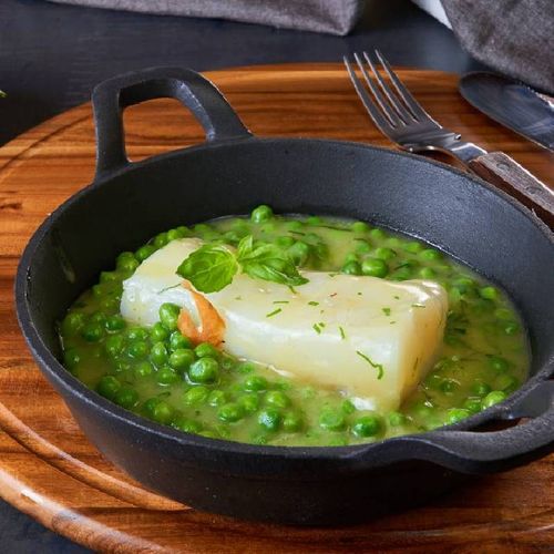 Bacallà en pilpil de pèsols